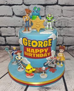 toy story theme cake with toys - Tamworth