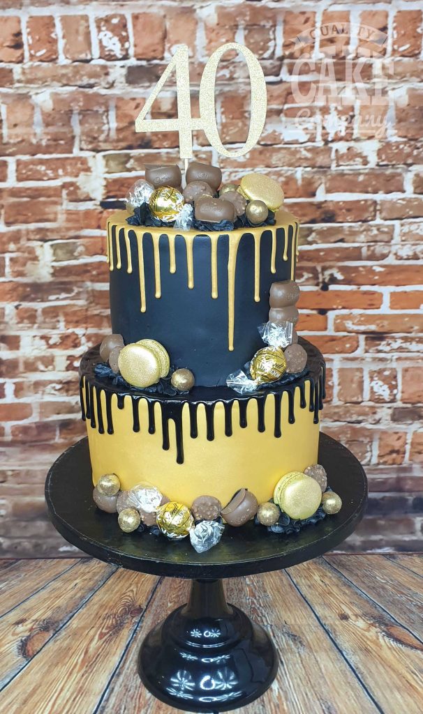 two tier black and gold drip cake - tamworth