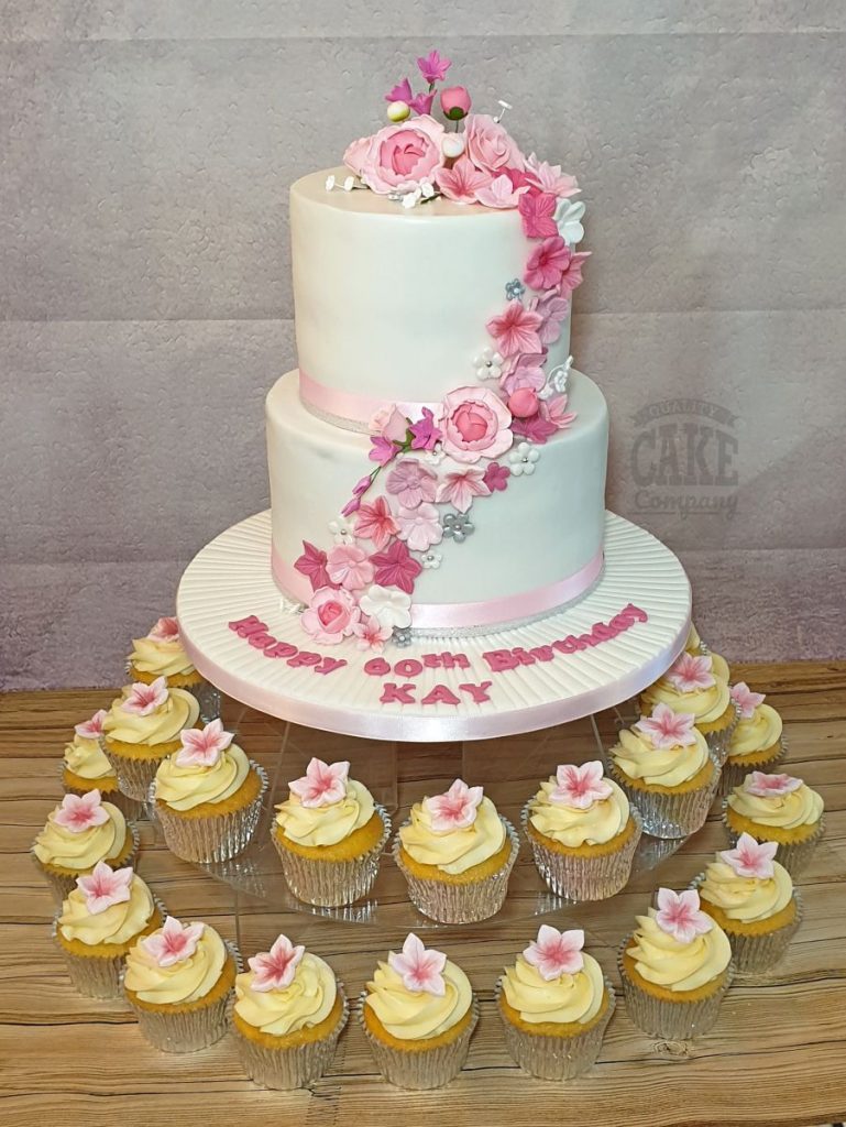 two tier pink floral cascade with matching cupcakes