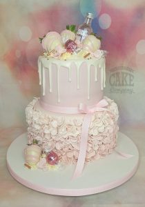 two tier pale pink ruffle drip cake - tamworth