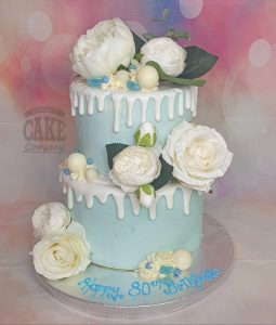 two tier powder blue and white drip cake - tamworth