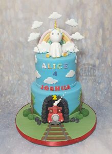 two tier unicorn train joint birthday cake - Tamworth
