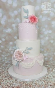 wedding four tier elegant soft pink and ivory with sugar flowers swags and piped dots Tamworth West Midlands Staffordshire