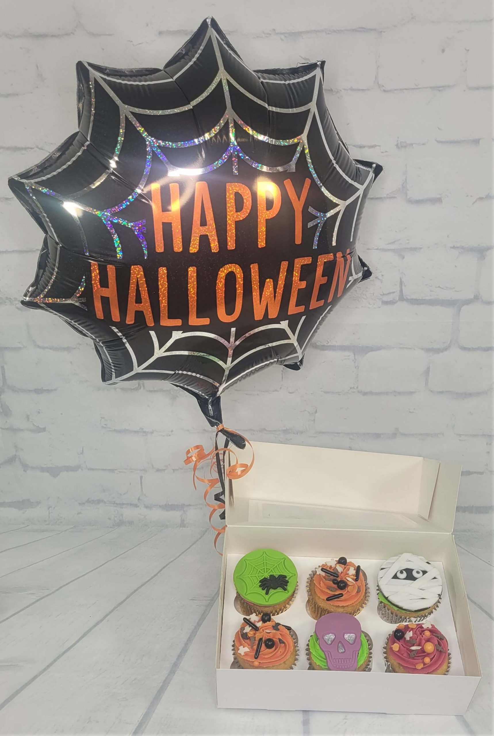 https://qualitycakecompany.com/wp-content/uploads/2023/04/Halloween-cupcakes-and-balloon-deal-2022-scaled.jpg