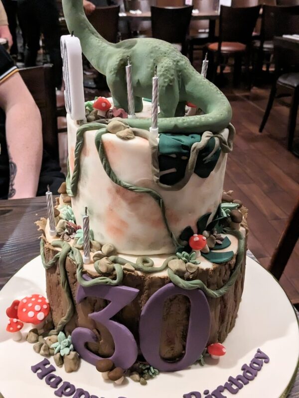 Dinosaur on 30th birthday cake