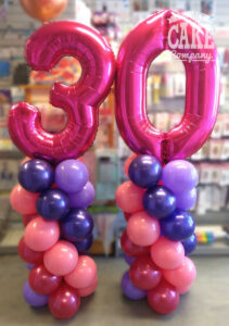 30th birthday balloon columns in pinks and purples - Tamworth