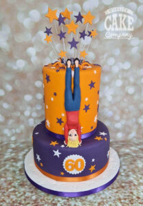 two tier handstand novelty birthday cake