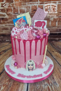 pink dolly inspired birthday drip cake
