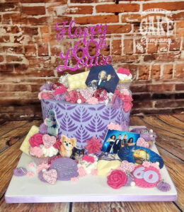 purple and pink cascade of treats hobby birthday cake - Tamworth