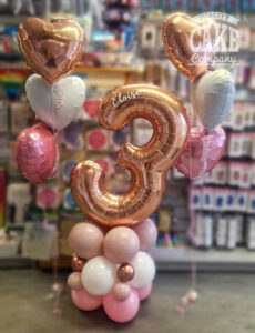 kids 3rd birthday balloon coulmn and matching bunches in pink and rose gold - Tamworth