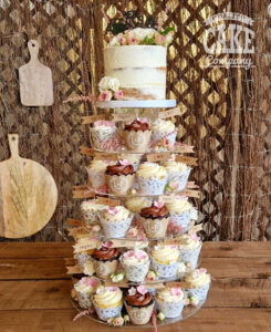rustic wedding cupcakes in lace wraps - tamworth