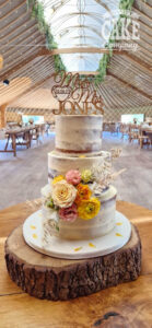 semi naked wedding cake with roses thorpe garden - tamworth