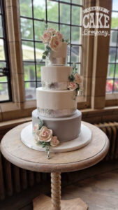 four tier silver wedding cake with roses - tamworth