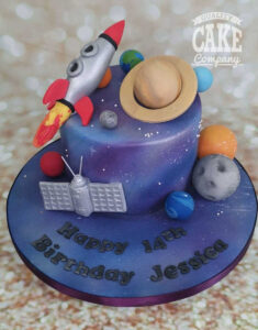 space theme cake with rocket and planets - tamworth