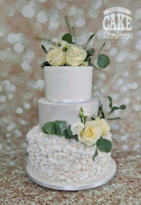 three tier ruffle shimmer wedding cake - tamworth