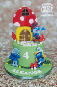 Smurfs kid 4th Birthday cake with toadstool - tamworth