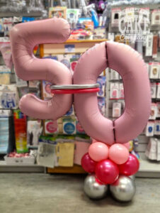 pale pink 50th birthday number balloon hug column display - Tamworth