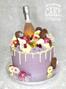 lilac sweetie drip cake with prosecco