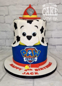 two tier paw patrol cake with marshal face on the top